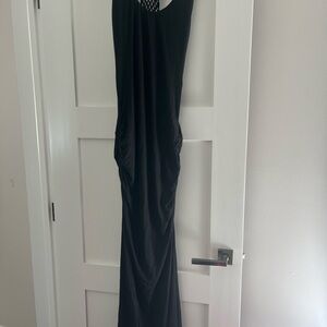 Black maxi dress with synch details, 2 side slits and crochet detail on the back